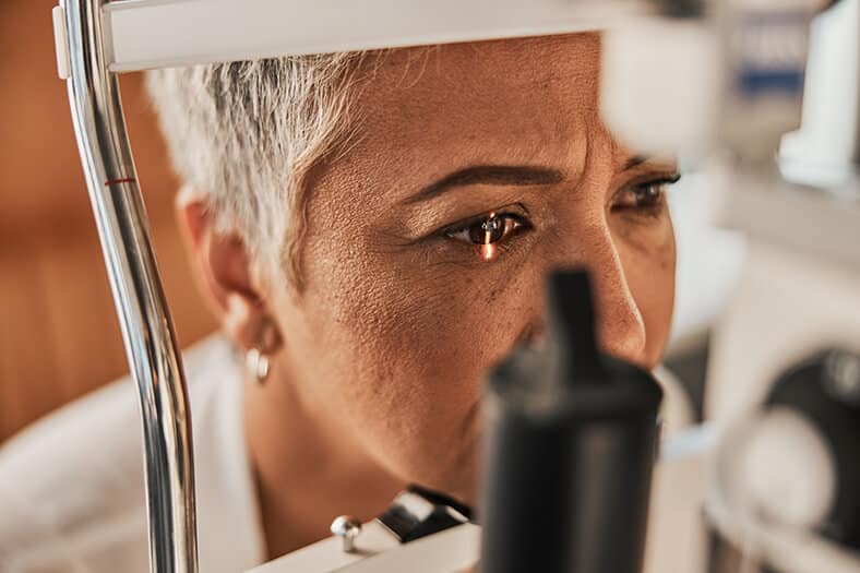 Woman getting eye exam